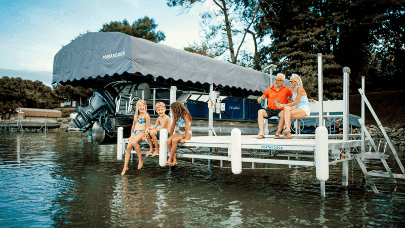 couple watching grandchildren while sitting on a Porta-Dock multi-dock